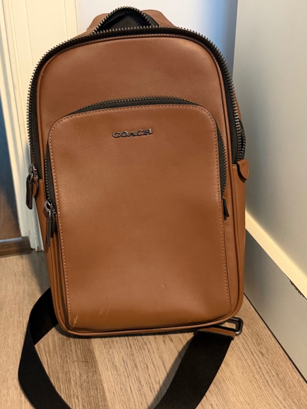 Coach camel leather sling bag